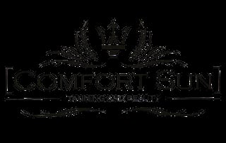 Kcomfort Skincare logo with ornate crown and flourish design elements on black background